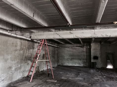 steel box encased in the concrete floor of office|emt encased under concrete.